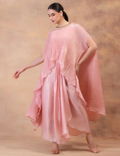 Model wearing the 'BLUSH PINK' kaftan and dhoti set in Singapore, crafted in micro-pleated georgette satin with intricate hand embroidery.