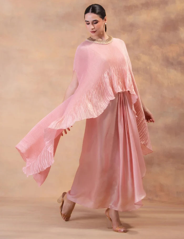 Model wearing the 'BLUSH PINK' kaftan and dhoti set in Singapore, crafted in micro-pleated georgette satin with intricate hand embroidery.