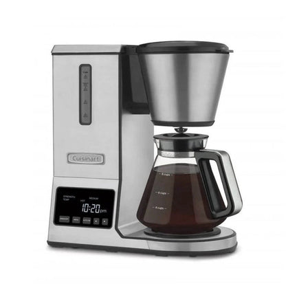 Catalog image of Cuisinart PurePrecision coffee brewer with glass carafe filled to the 8-cup mark and illuminated controls.