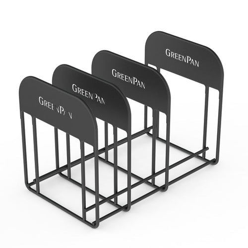 Black metal cookware rack with four slots for organizing pans, displayed empty.