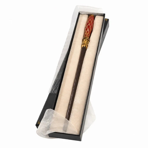 Redwood interactive wand with a red-and-gold lattice handle and brown shaft in its open presentation box.