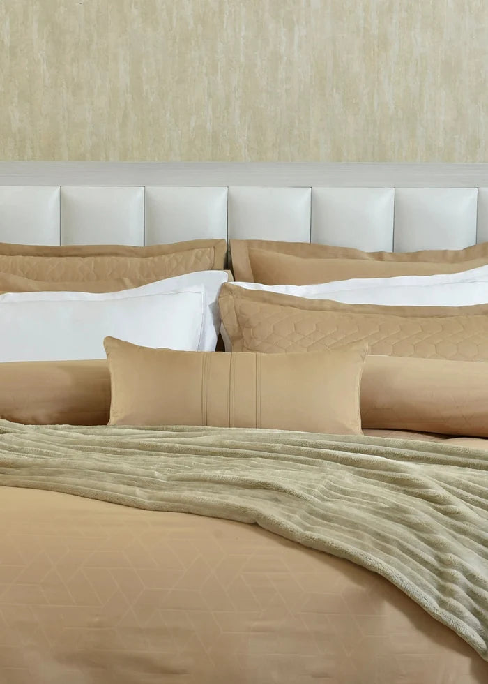 Butter cotton sateen duvet cover set with matching pillow shams and bed pillows
