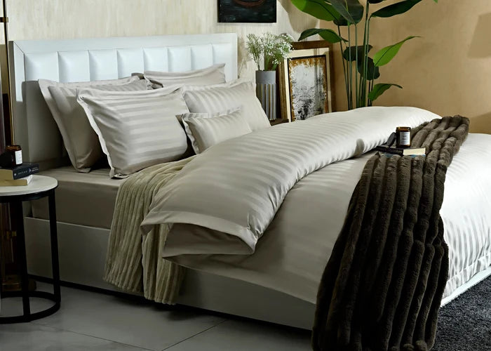 7-piece duvet cover set with beige striped duvet and coordinating pillow shams