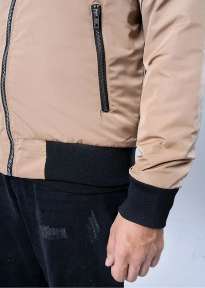 Men's winter memory jacket close-up: khaki front zip, black pocket trim.