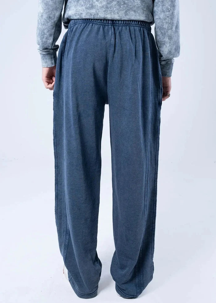 Men's navy terry pull-on trousers with elastic waistband and wide relaxed legs