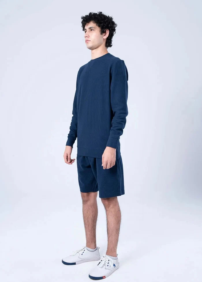 Navy crewneck sweatshirt with matching shorts, long sleeves with ribbed cuffs and hem