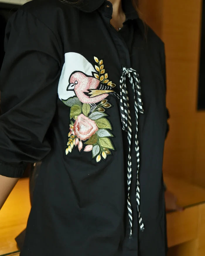 Black Bemberg Silk Co-Ord Set featuring a sculpted floral tie-detail shirt paired with ivory straight-fit pants for an elegant and contemporary look.