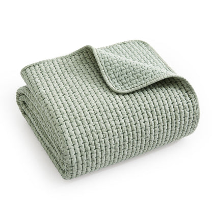 Pick-Stitch Artisan Quilted Throw in a light green color, showcasing quilted texture and pick-stitch detailing.