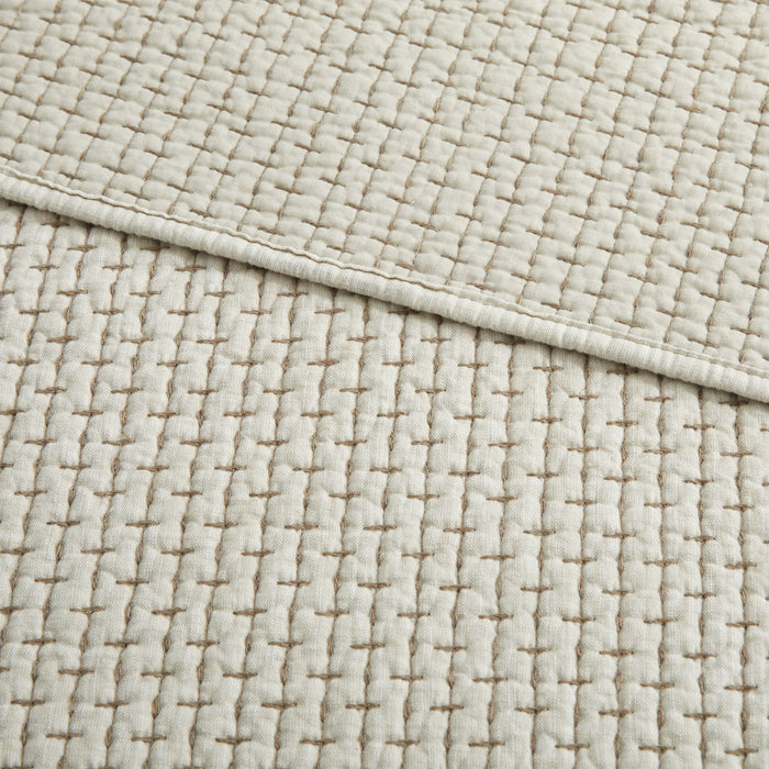 Close-up of the Pick-Stitch Artisan Quilted Throw showcasing detailed pick-stitch texture on cotton slub fabric.