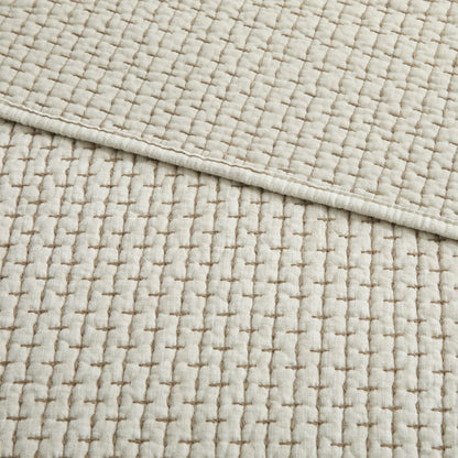 Close-up of the Pick-Stitch Artisan Quilted Throw showcasing detailed pick-stitch texture on cotton slub fabric.