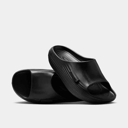 Side/top view of the Nike ReactX Rejuven8 Slides.