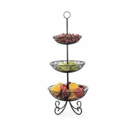 Black TableCraft three-tier display basket with decorative scrollwork, shown holding fruit.