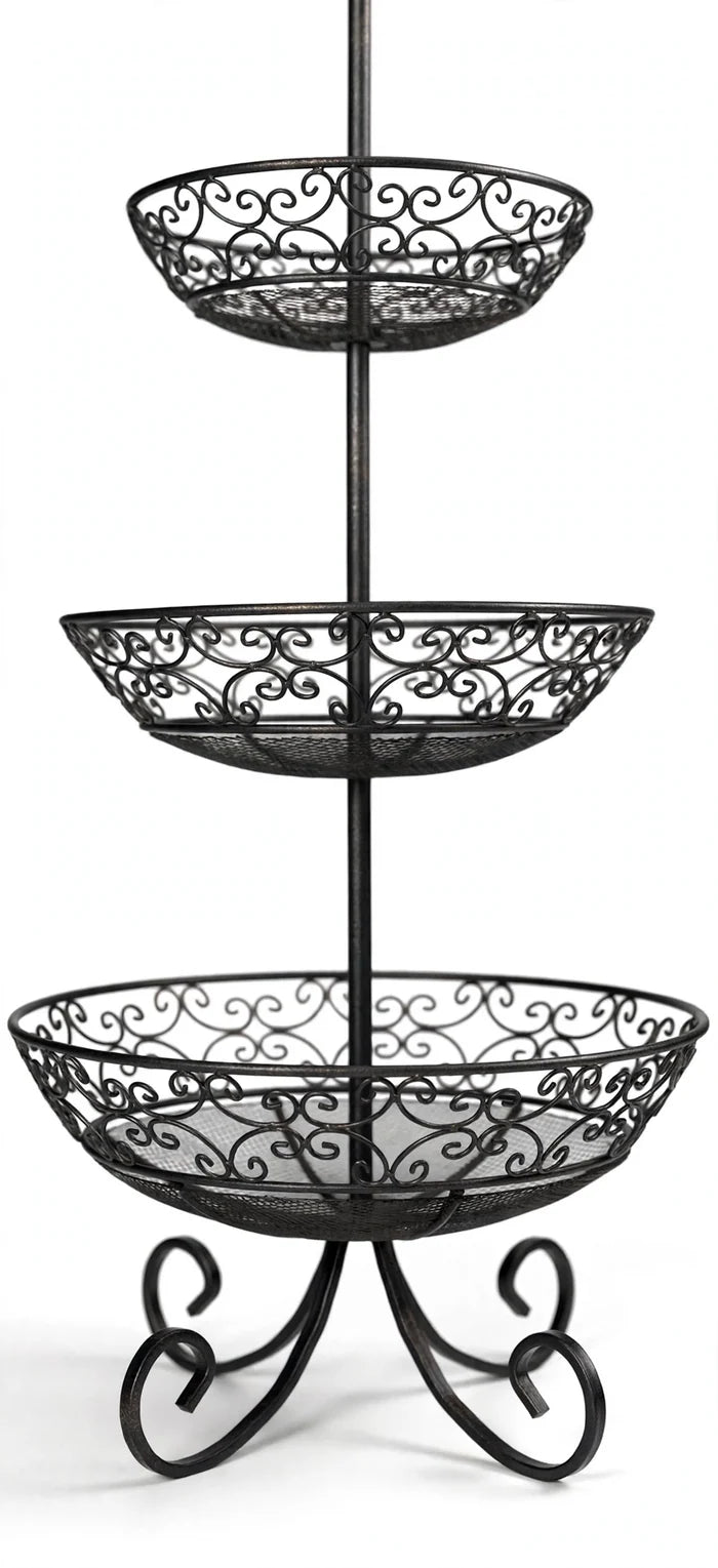 Close-up of the black three-tier basket showing decorative scrollwork, mesh basket bases and curved feet.