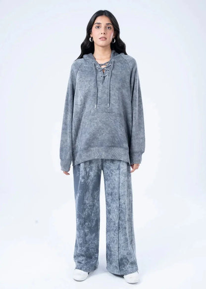 Women's charcoal terry pullover hoodie with drawstring, front view with wide-leg pants